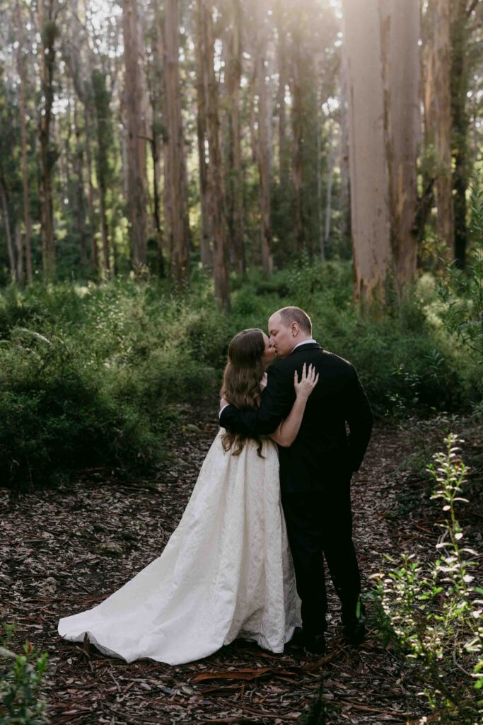 couple holding hand in boranup forrest