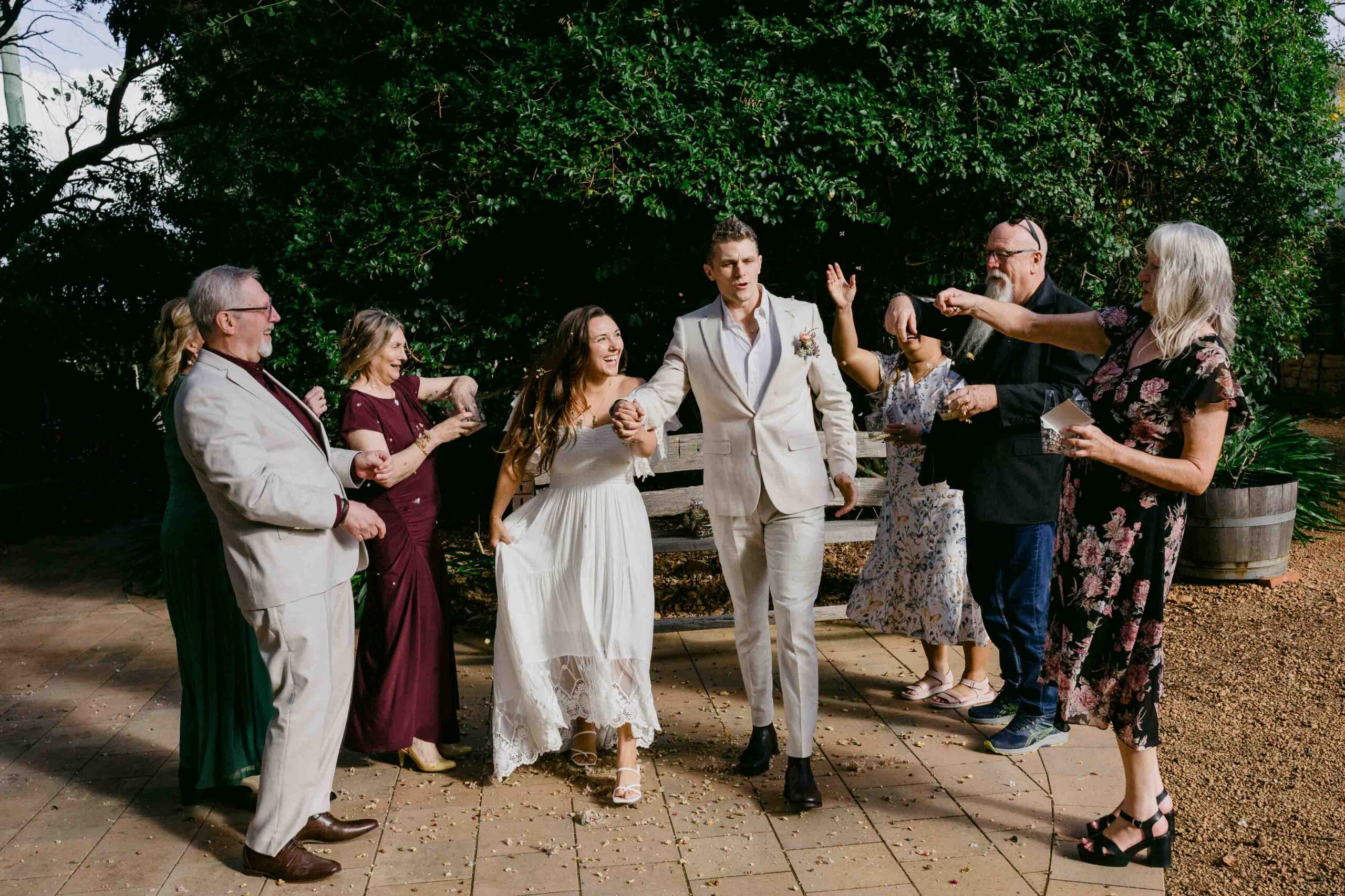 Family laughing together after a relaxed Perth micro wedding ceremony.