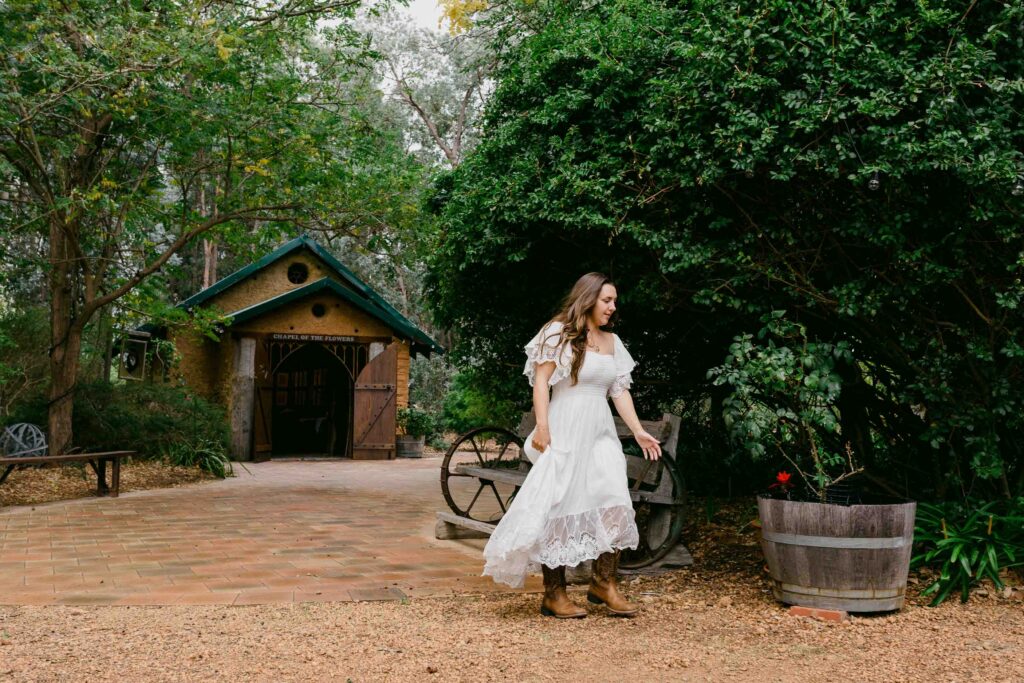 Newlywed couple walking outside a small chapel during their Margaret River elopement