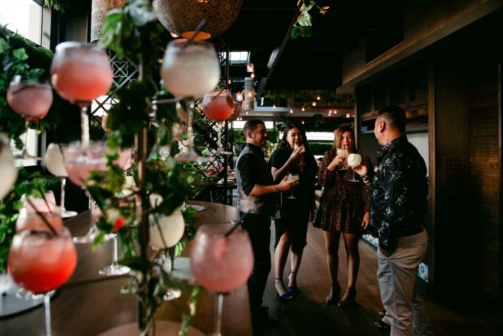 Guest enjoying drinks after the micro-wedding ceremony