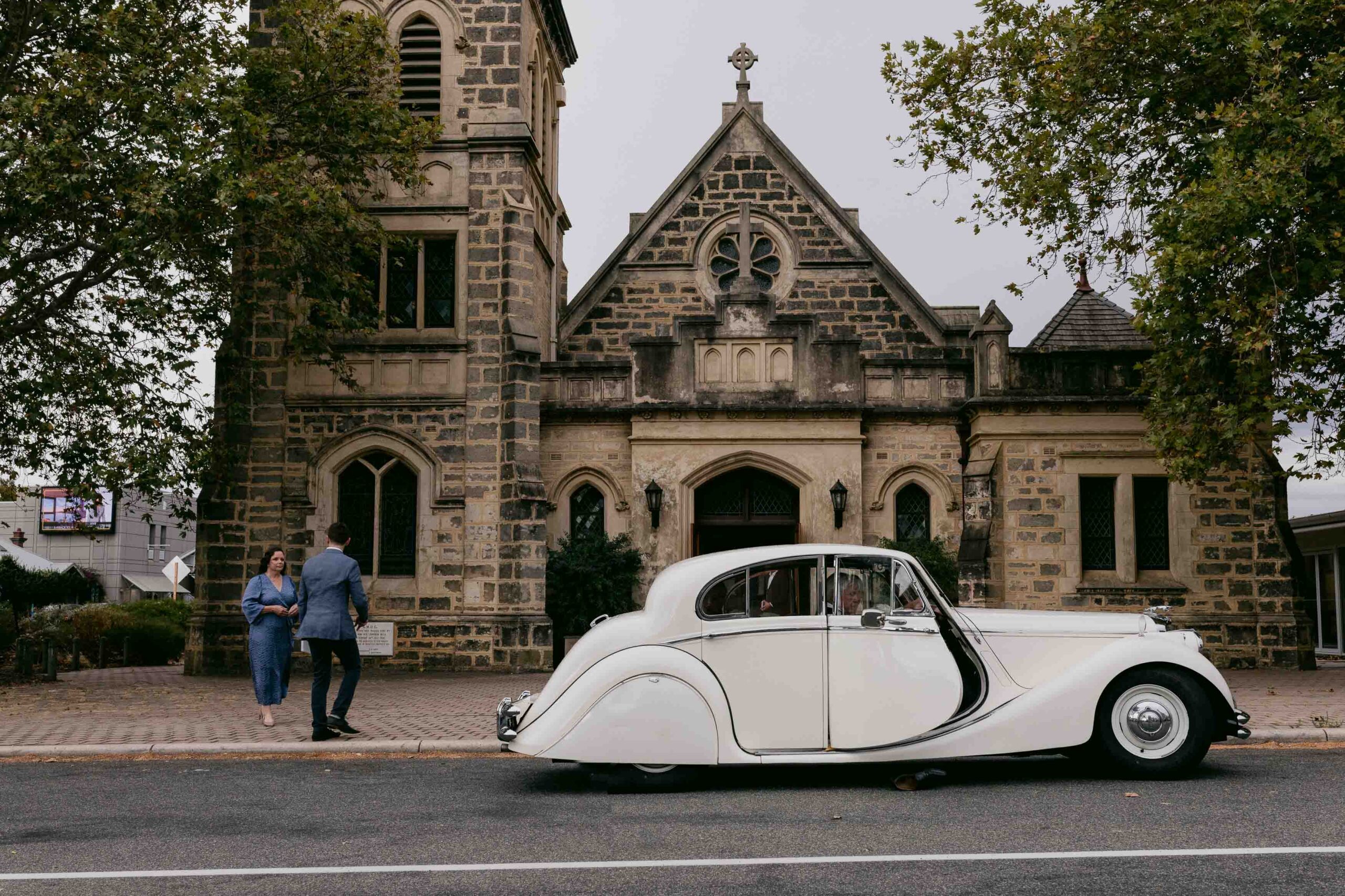 church arrival with classic car at church ceremony for microwedding near cottesloe