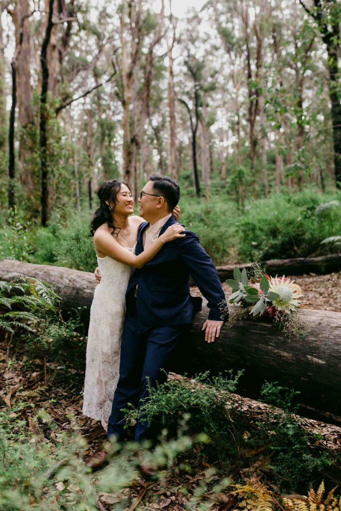 Max and Abby laughing during their Margaret River pre-wedding shoot