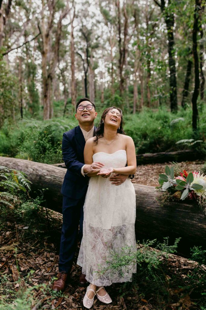 Max and Abby laughing during their Margaret River pre-wedding shoot