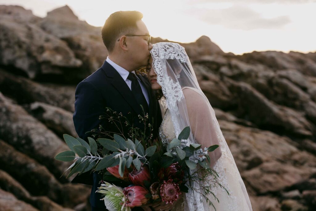 Margaret River pre-wedding photograph at Sugarloaf Rock during sunset