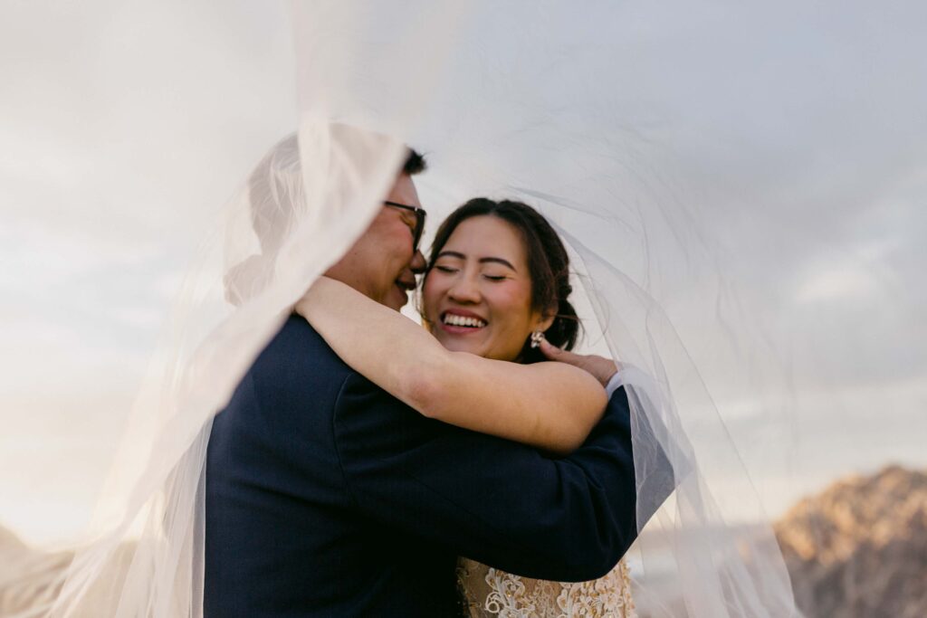 White veil moving in the wind during a Sugarloaf Rock photoshoot
