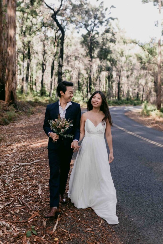 Kenneth and Flora photographed between the karri trees of Boranup Forest