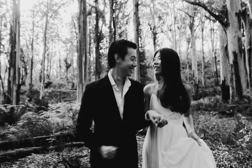 Candid Ken and flora walking through the forrest