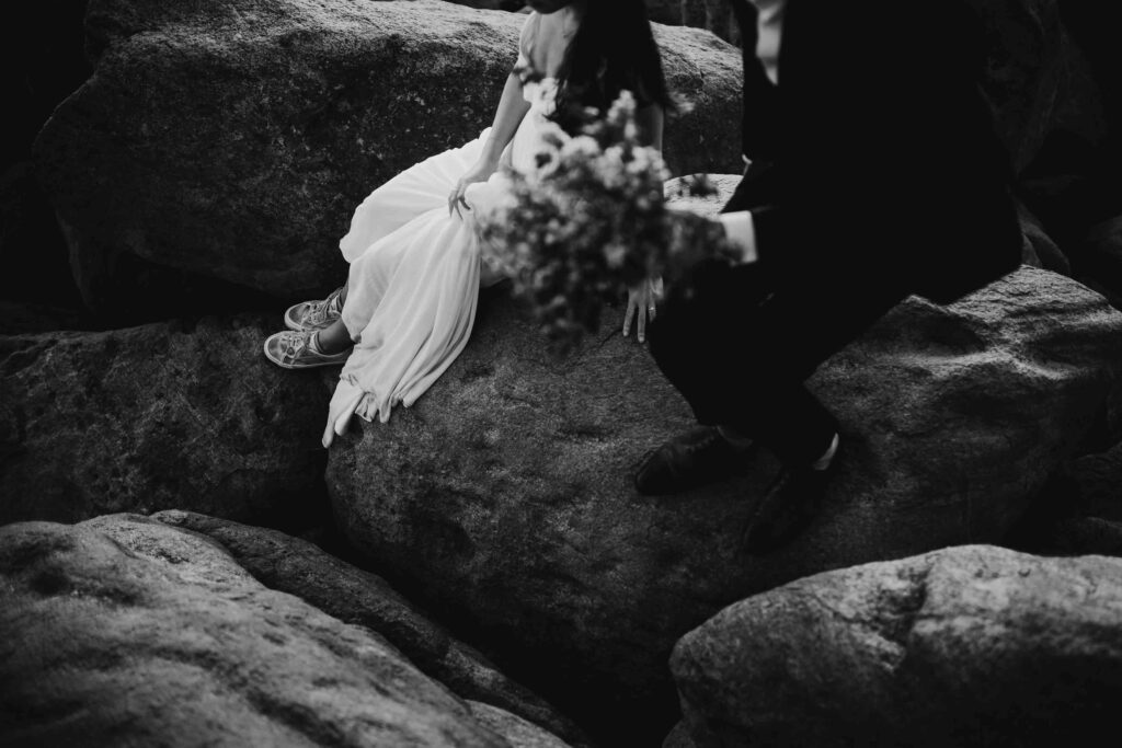 Black and white Artistic couple photograph among the rocks at Injidup Natural Spa