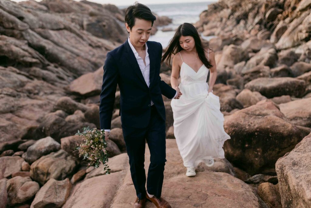Alt text: Kenneth and Flora walking together near Injidup Natural Spa
