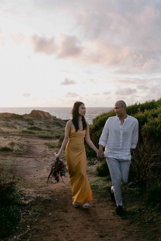 couple walking at Yallingup injidup spa pre-wedding session Margaret River