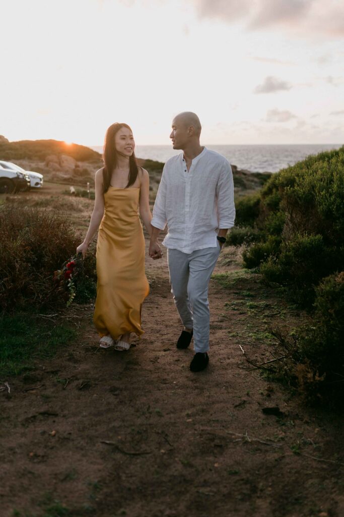 couple walking at Yallingup injidup spa pre-wedding session Margaret River