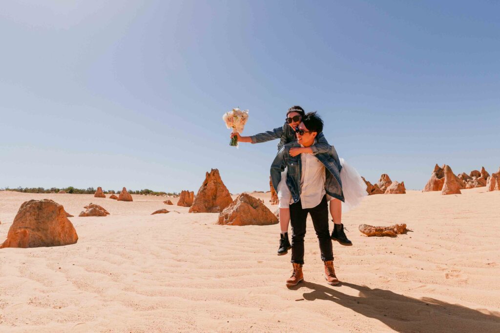 Marco and Rachel having fun during their pre-wedding shoot in Nambung National Park