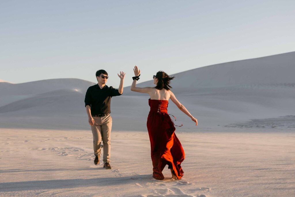 High five for the fun and adventure at lancelin dunes for their pre-wedding