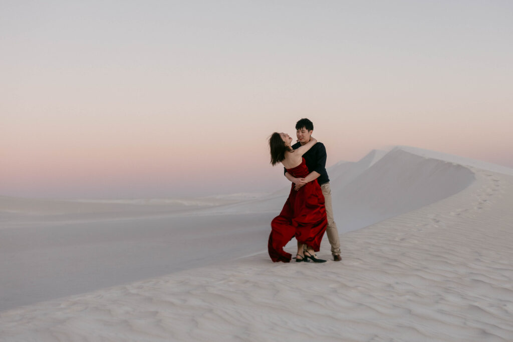 Fun poses together with the dunes in the background for their pre-wedding shoot in Lancelin