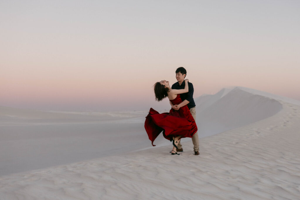 Fun poses together with the dunes in the background for their pre-wedding shoot in Lancelin