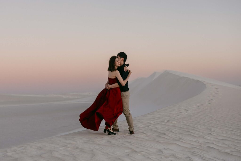 Fun poses together with the dunes in the background for their pre-wedding shoot in Lancelin