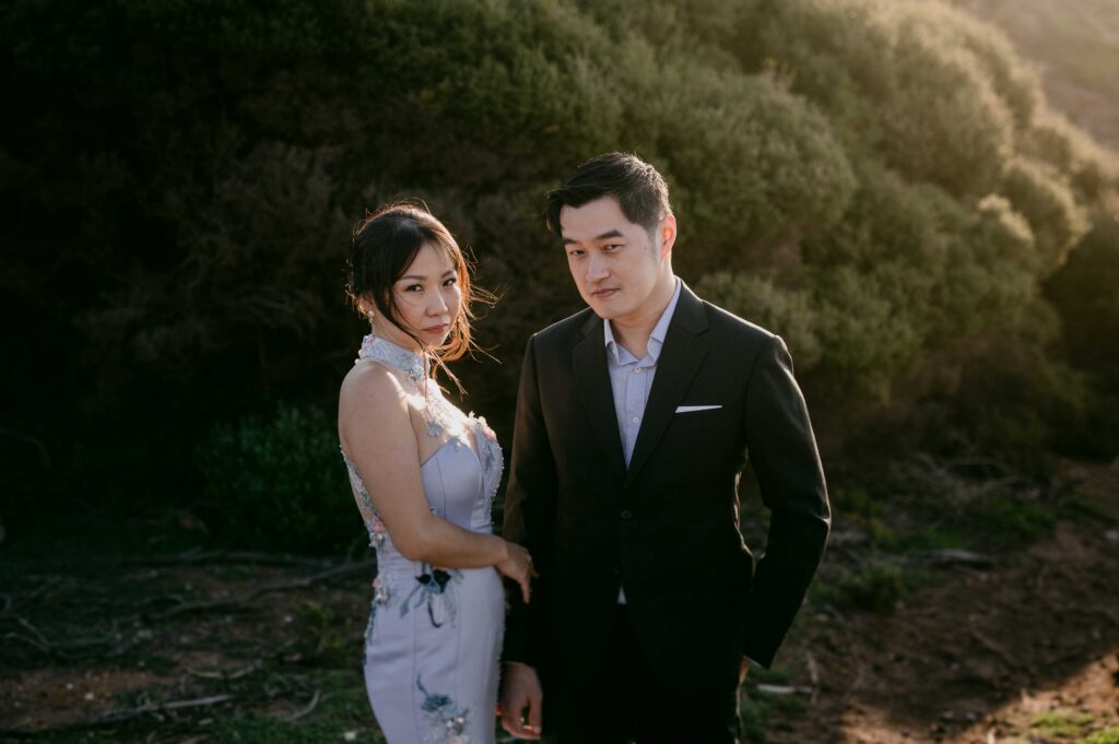 editorial style portrait for singapore couple at sugarloaf rock