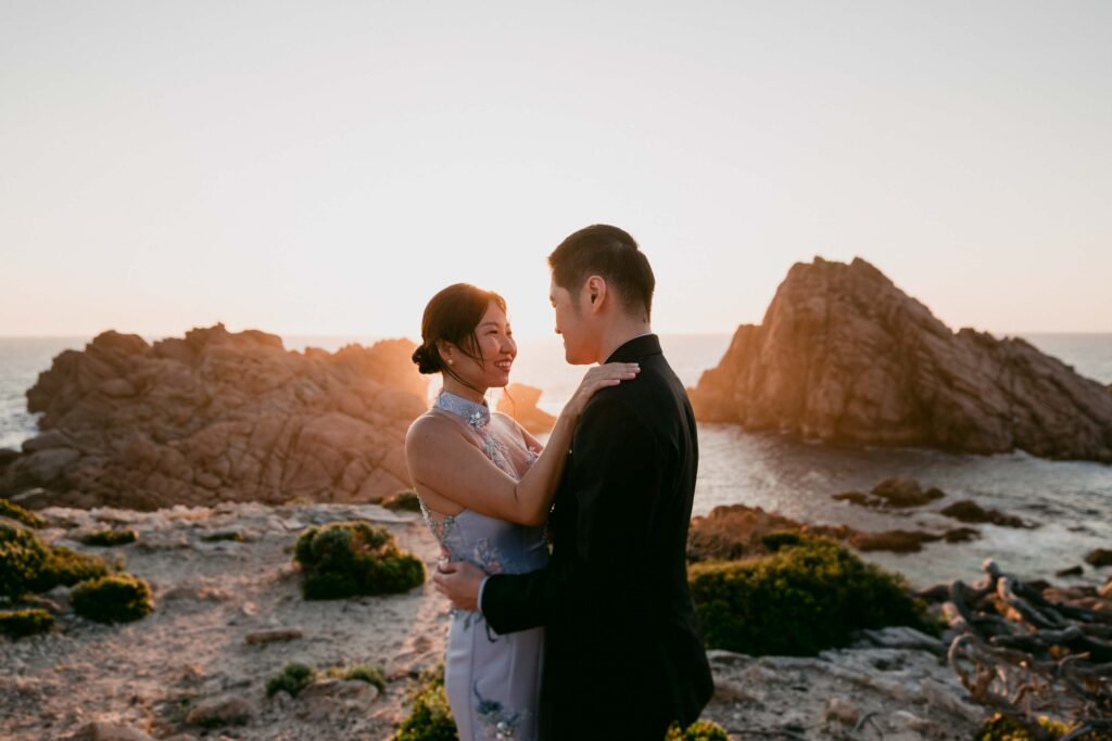 sunset with couple in forgroad at sugarloaf rock for their pre wedding photos