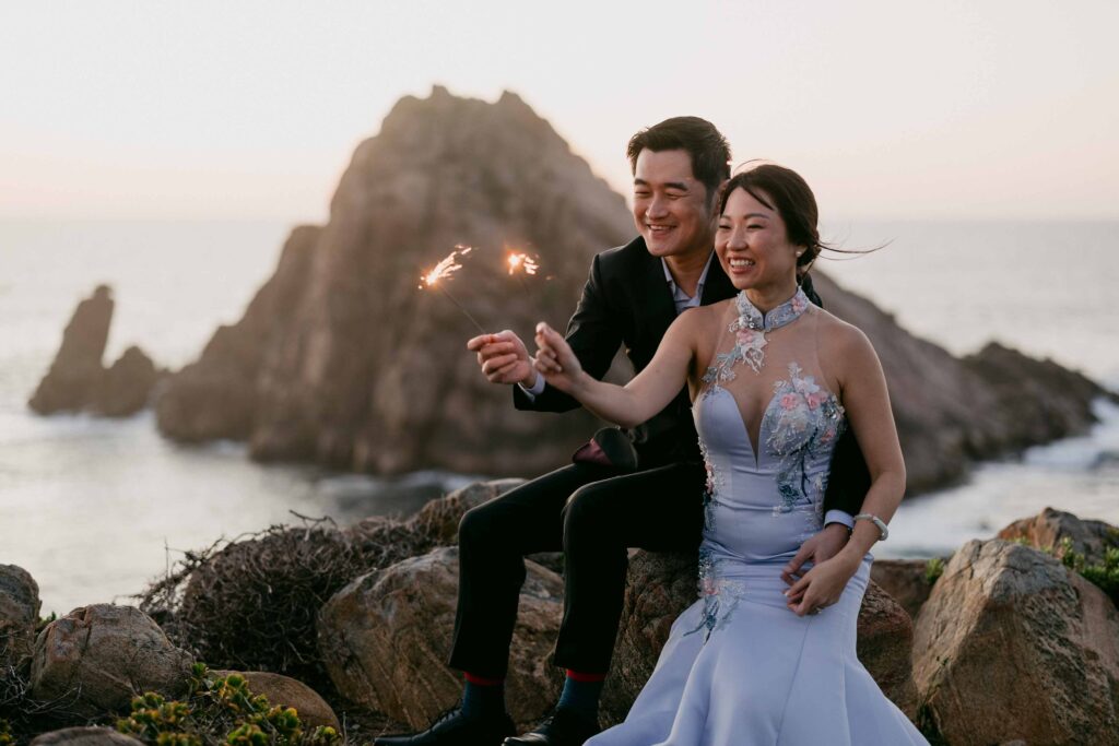Artistic sparkler photograph beside the Sugarloaf Rock coastline