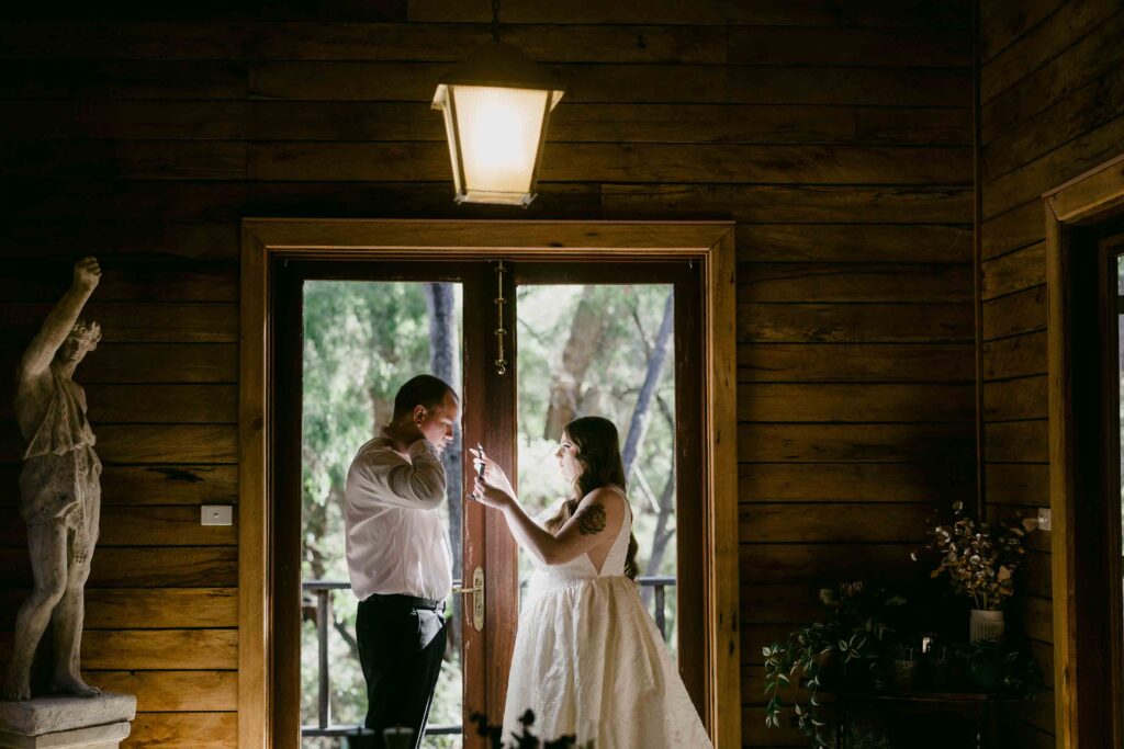 Megan and Jake getting ready together before their Margaret River elopement