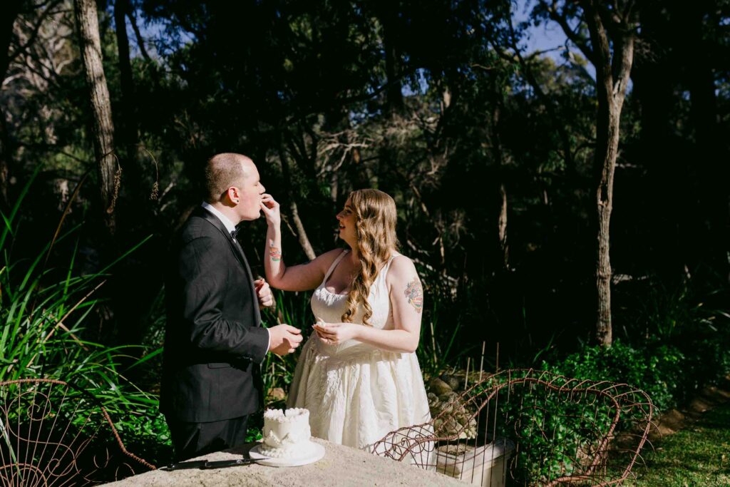 Megan and Jake enjoying their chocolate wedding cake at La Forêt Margaret River