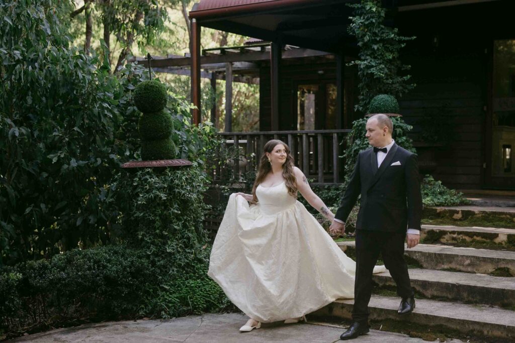 Bride and Groom walking together from La foret Lodge