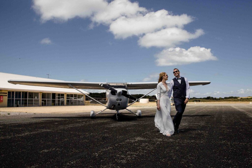 couple portraint with plane in Background after the micro-wedding in Kings Park 