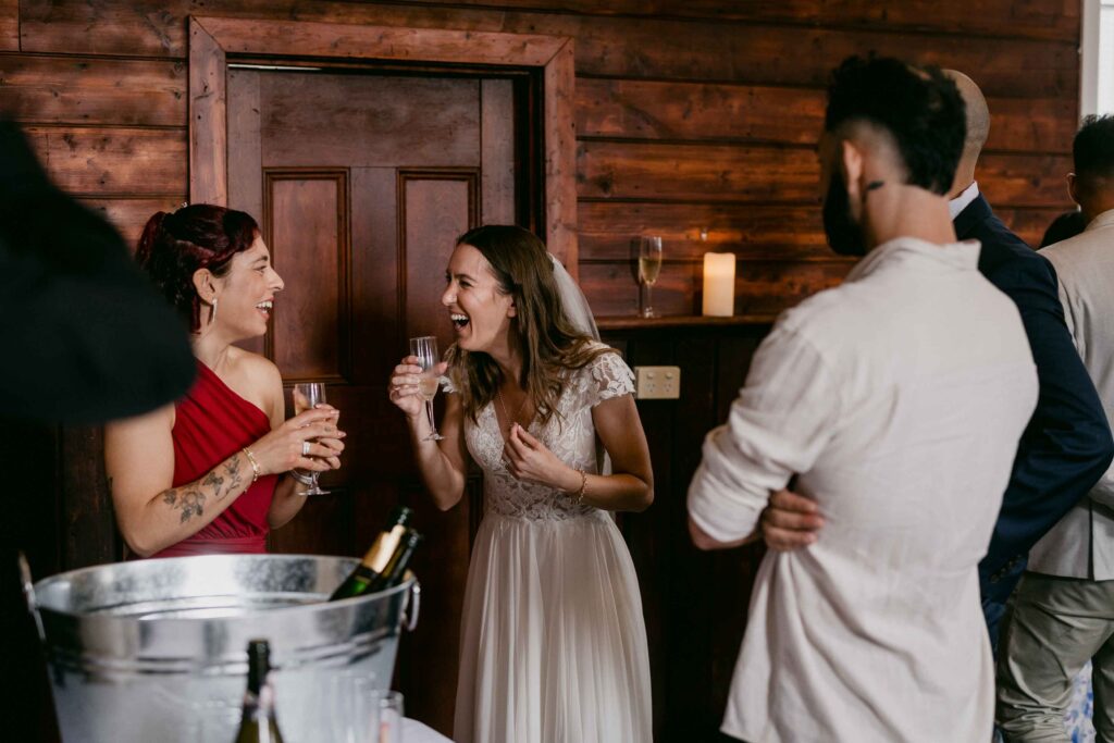 Newlyweds enjoying drinks with guests after their Jarrahdale church wedding