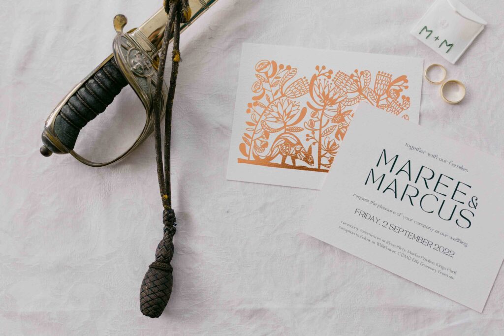 wedding layflat with family sword invitation and rings