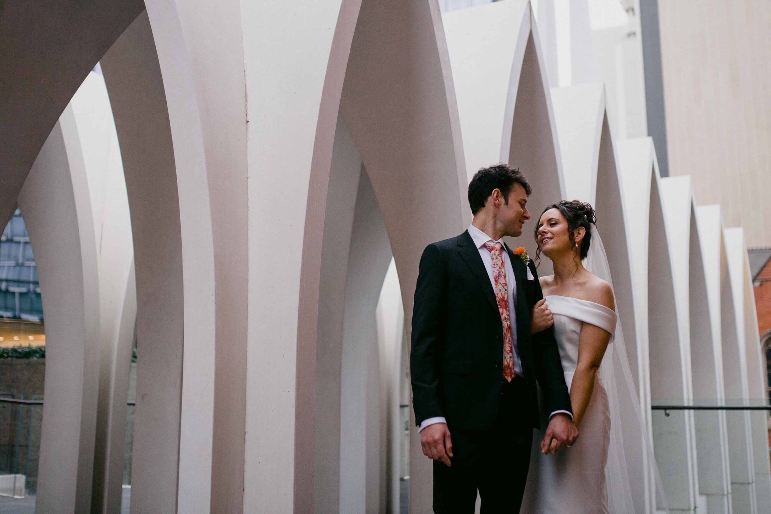 Newlyweds walking through Perth after their micro wedding