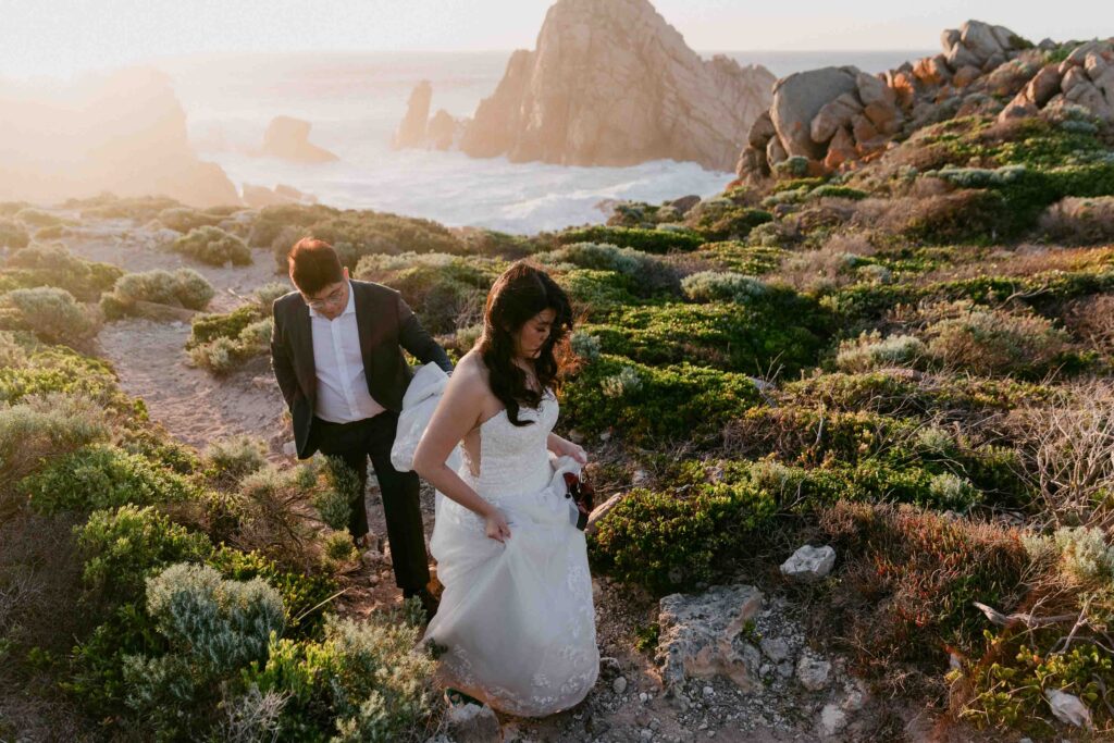 Singapore couple completing their Perth pre-wedding shoot at Sugarloaf Rock